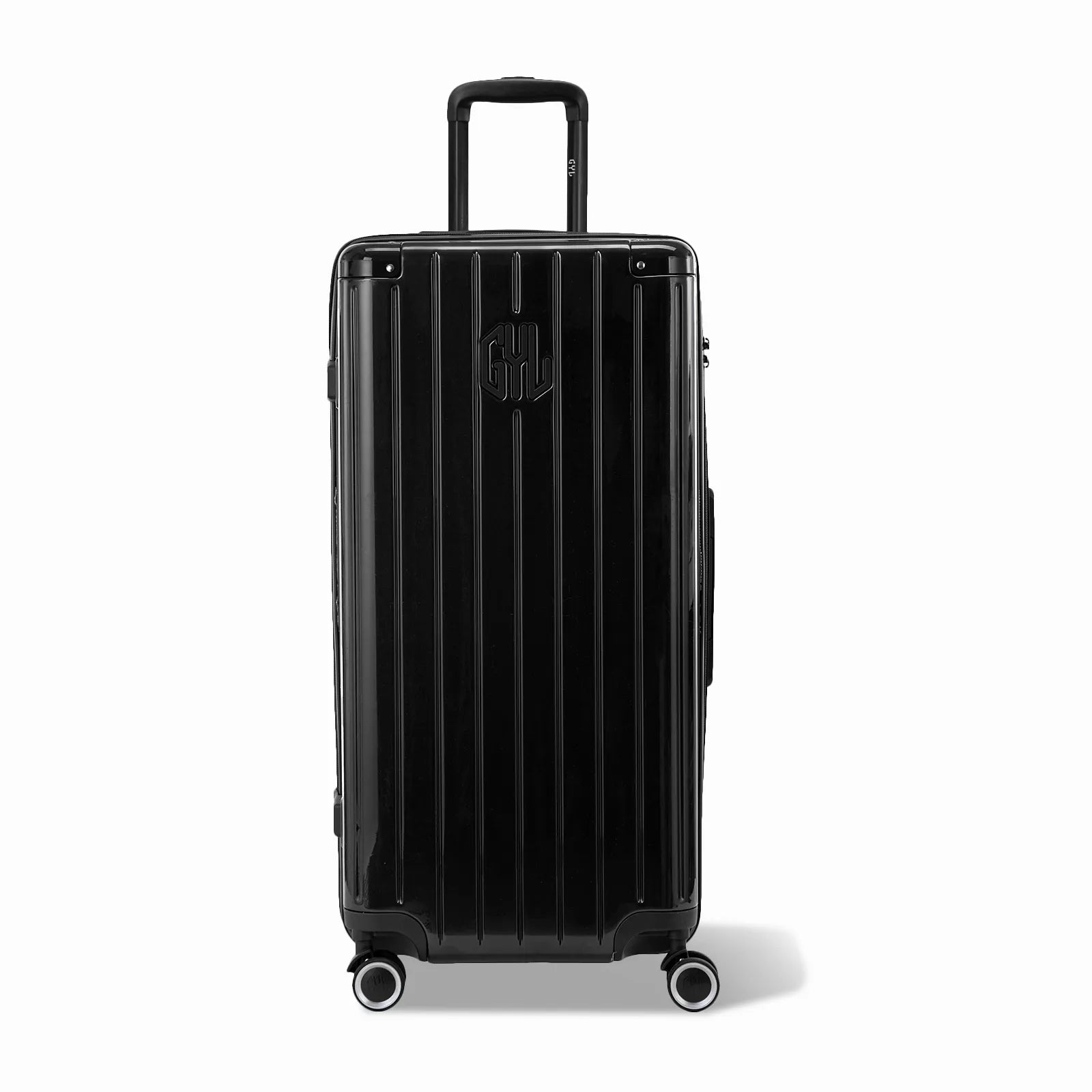 Valise trunk GYL taille XL en polycarbonate noir vue de face, avec trolley déployé et roues 360°.