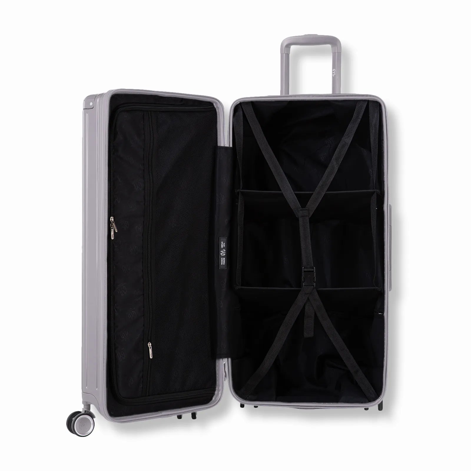 Valise trunk GYL XL argent ouverte en position verticale, montrant la double séparation intérieure et les sangles de maintien.