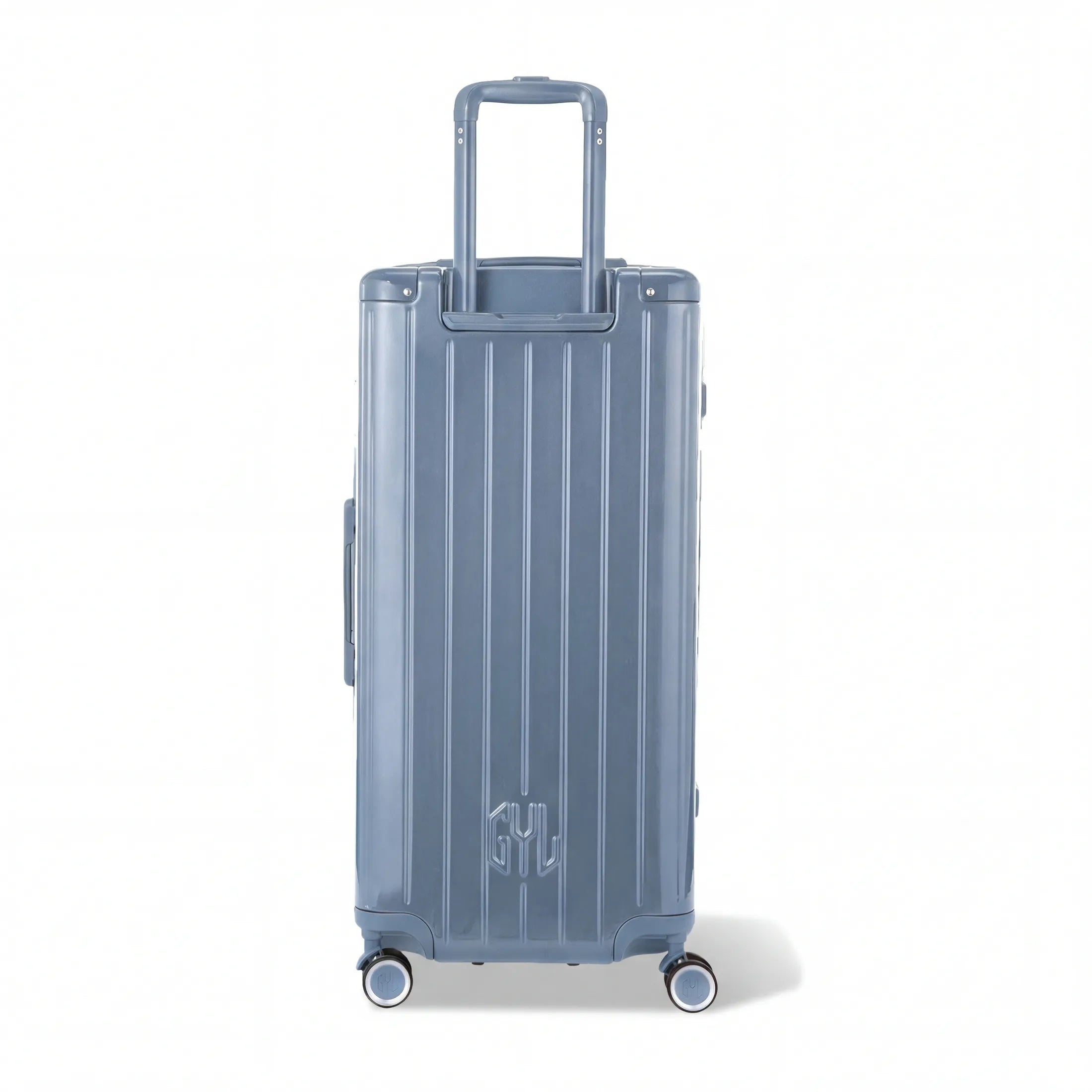 Dos de la valise trunk GYL XL bleu gris avec trolley télescopique sorti et logo embossé.
