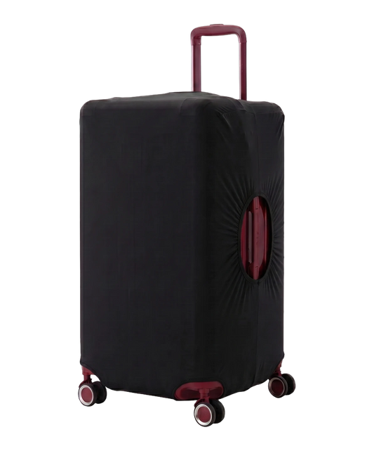 Pack Valise Trunk GYL en polycarbonate coloris rouge fonce avec housse de protection stretch noire, poignee telescopique et roues bordeaux apparentes, vue trois quarts avant