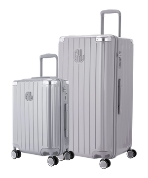 Pack 2 valises rigides GYL Trunk XL et Cabine S argent, polycarbonate, 4 roues 360°, vue trois quarts
