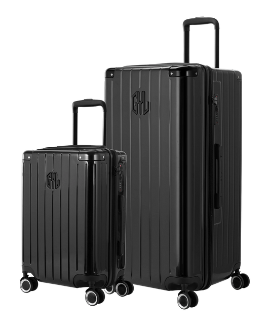 Pack 2 valises rigides GYL Trunk XL et Cabine S noires, polycarbonate, 4 roues 360°, vue trois quarts