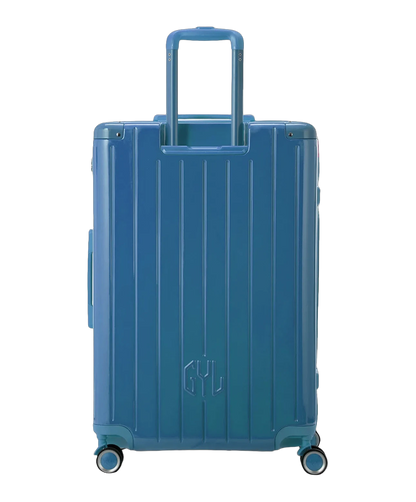 Valise rigide Intemporelle en polycarbonate coloris bleu grise vue de dos avec poignees integrees et roulettes pivotantes GYL