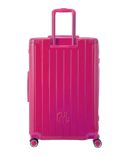 Roue double 360 de la valise GYL Intemporelle fuchsia avec gravure du logo sur le moyeu