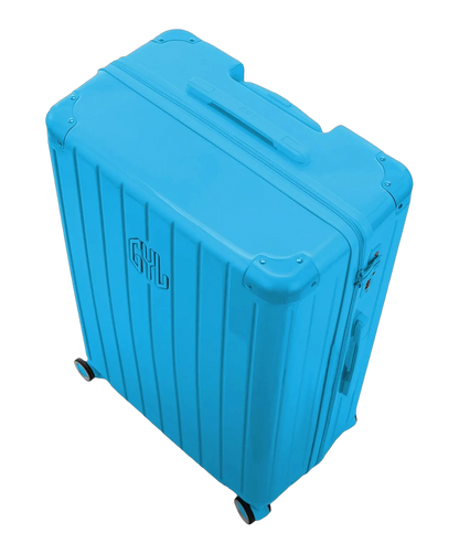 Interieur compartimente de la valise GYL Intemporelle menthe avec sangles croisees et poches filet