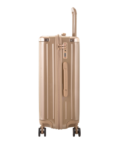 Valise Intemporelle en polycarbonate semaine 65 cm coloris champagne vue de profil avec serrure TSA integree