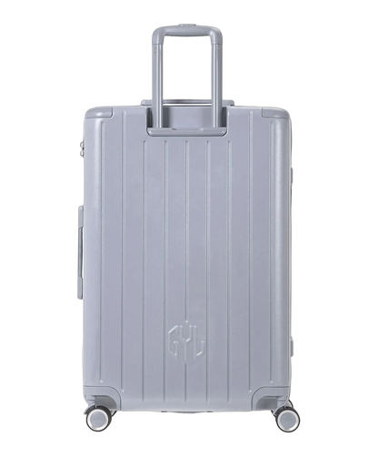 Valise rigide Intemporelle argent vue de dos avec poignees integrees et roulettes pivotantes GYL