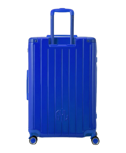 Valise rigide Intemporelle bleu vue de dos avec poignees integrees et roulettes pivotantes GYL