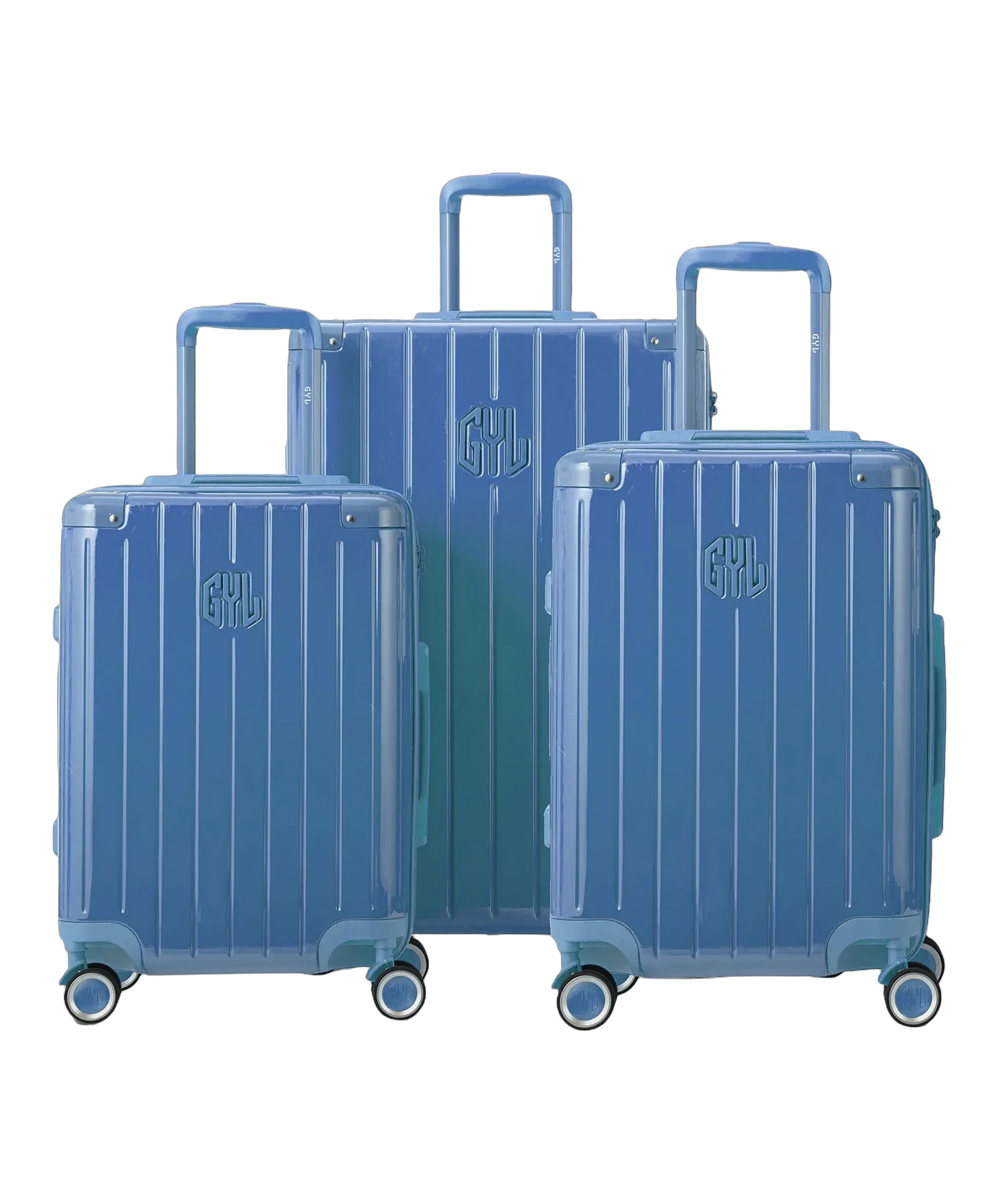 Set de 3 valises rigides Intemporelle en polycarbonate coloris bleu grise vue de face avec logo GYL