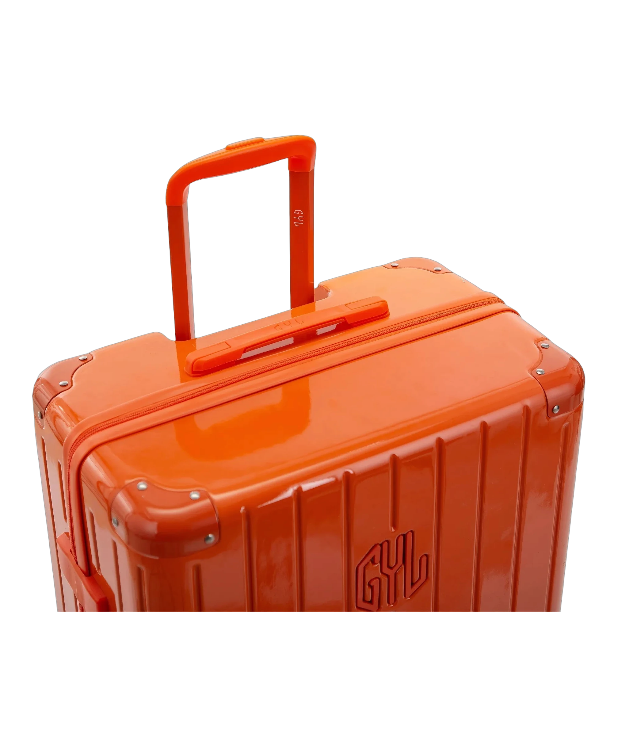 Poignee trolley telescopique GYL deployee sur la valise Intemporelle orange fonce en polycarbonate