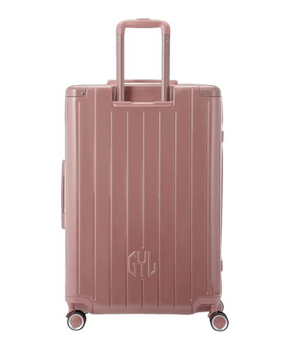 Valise rigide Intemporelle rose gold vue de dos avec poignees integrees et roulettes pivotantes GYL