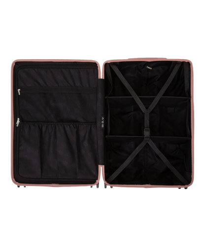 Interieur compartimente de la valise GYL Intemporelle rose gold avec sangles croisees et poches filet