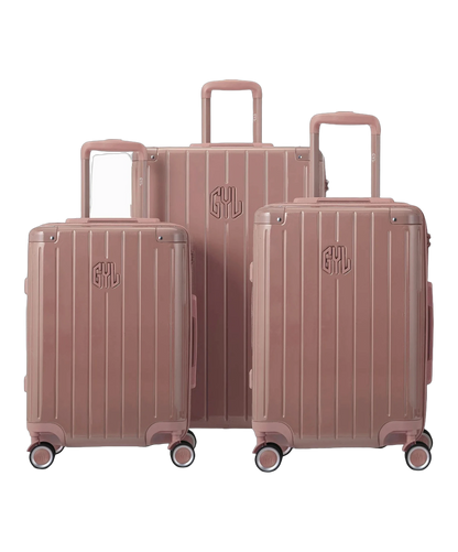 Set de 3 valises rigides Intemporelle rose gold vue trois quarts avec poignees telescopiques GYL