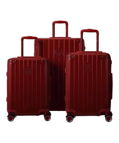 Set de 3 valises rigides Intemporelle rouge fonce vue trois quarts avec poignees telescopiques GYL