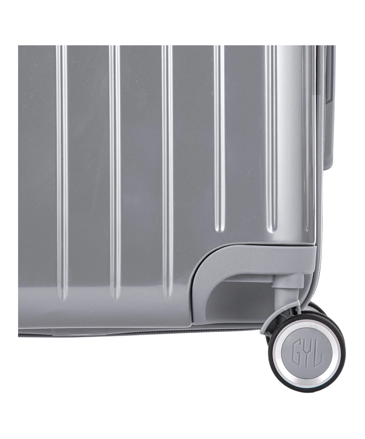 Valise Intemporelle en polycarbonate set de 3 valises cabine semaine et soute coloris argent detail roulette 360 degres sigle GYL