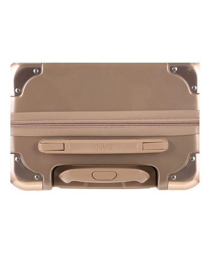Valise Intemporelle en polycarbonate set de 3 valises cabine semaine et soute coloris champagne vue du dessus avec poignee de portage