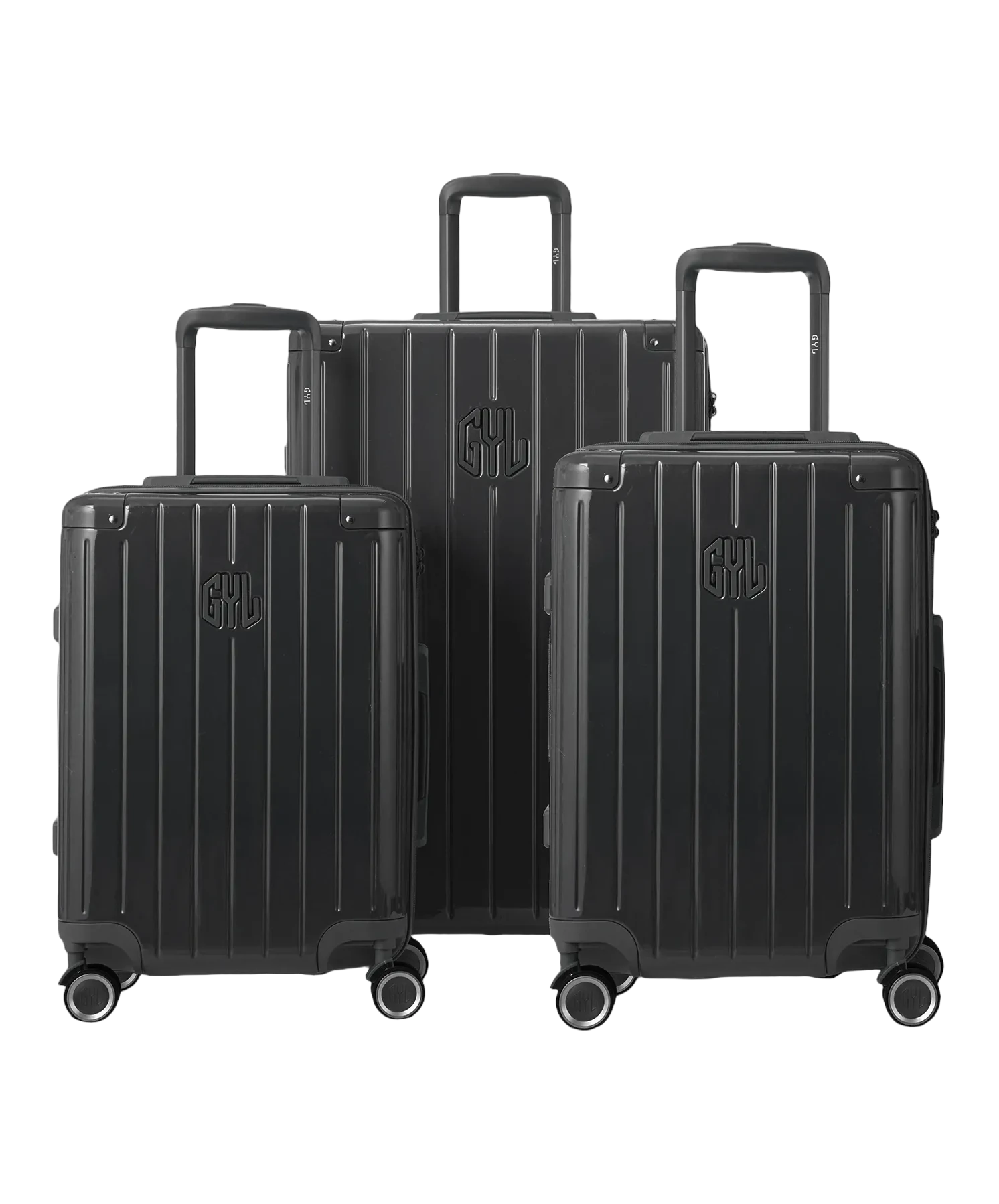 Set de 3 valises Intemporelle en polycarbonate cabine, semaine et soute coloris gris foncé glossy vue de face avec logo GYL, packshot GYL