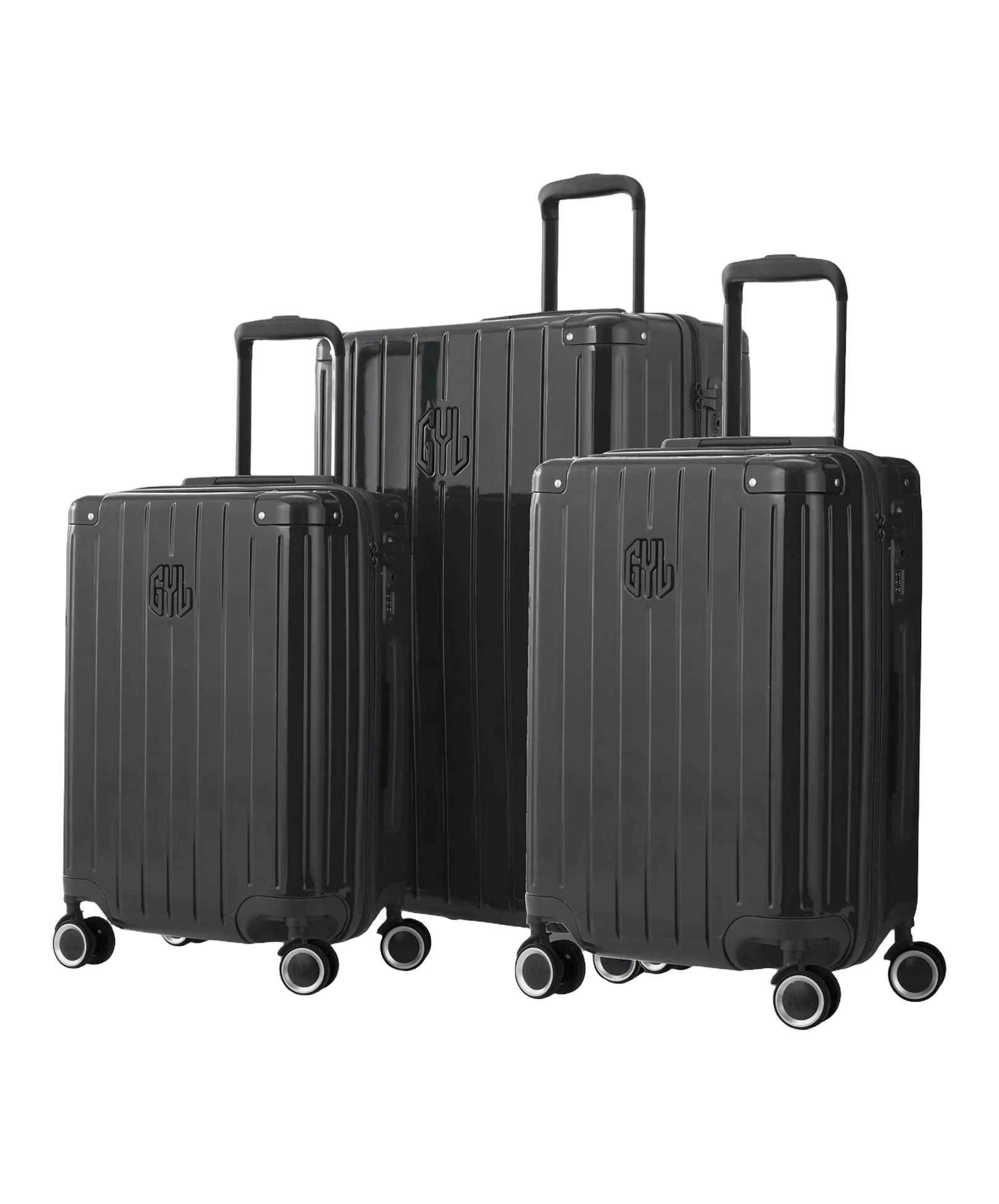 Set de 3 valises Intemporelle en polycarbonate cabine, semaine et soute coloris gris foncé glossy vue trois quarts avant avec trolleys télescopiques sortis et logo GYL, packshot GYL