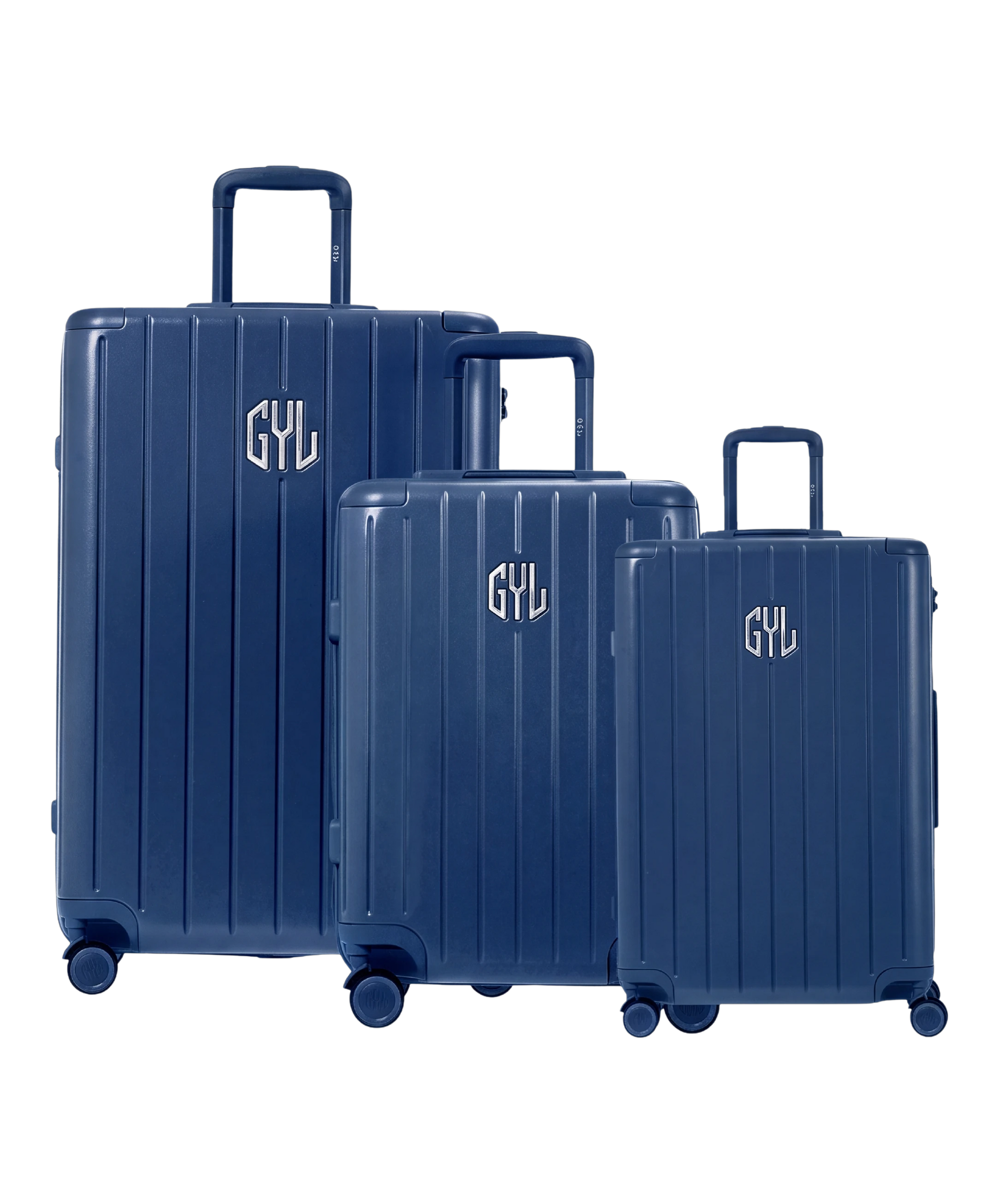Trio de valises rigides GYL Intemporelle marine mate avec coques nervurées et poignées télescopiques. #couleur_marine-mate