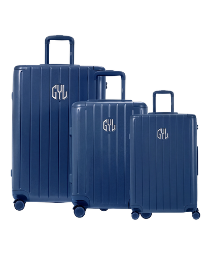Trio de valises rigides GYL Intemporelle marine mate avec coques nervurées et poignées télescopiques. #couleur_marine-mate