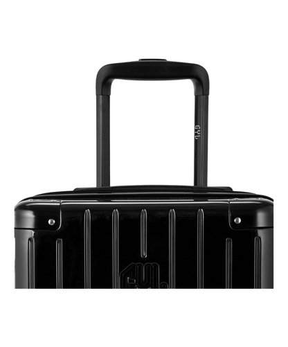 Valise Intemporelle en polycarbonate set de 3 valises cabine semaine et soute coloris noire detail poignee telescopique et logo GYL