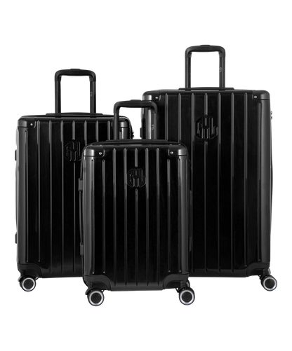 Valise Intemporelle en polycarbonate set de 3 valises cabine semaine et soute coloris noire vue de face du set complet