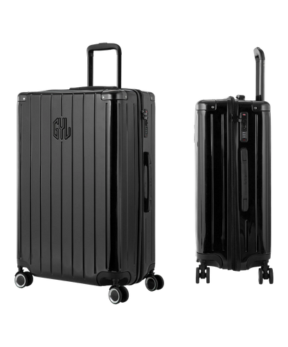 Valise Intemporelle en polycarbonate set de 3 valises cabine semaine et soute coloris noire vue trois quarts du set complet
