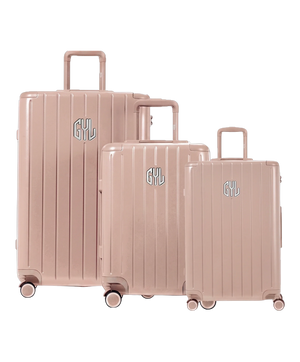 Trio de valises rigides GYL Intemporelle nude avec coques nervurées et poignées télescopiques. #couleur_nude