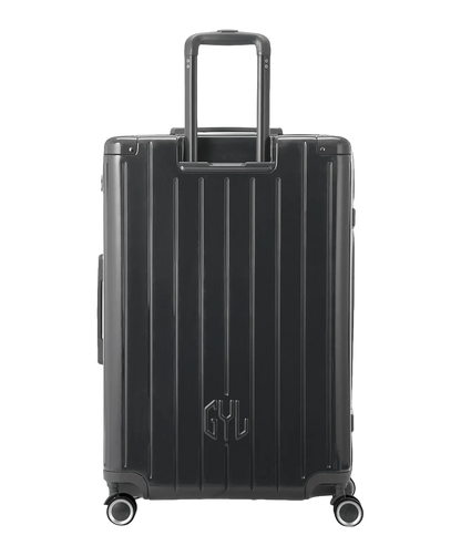 Valise Intemporelle soute en polycarbonate coloris gris foncé glossy vue arrière avec poignée télescopique sortie et logo GYL en relief, packshot GYL