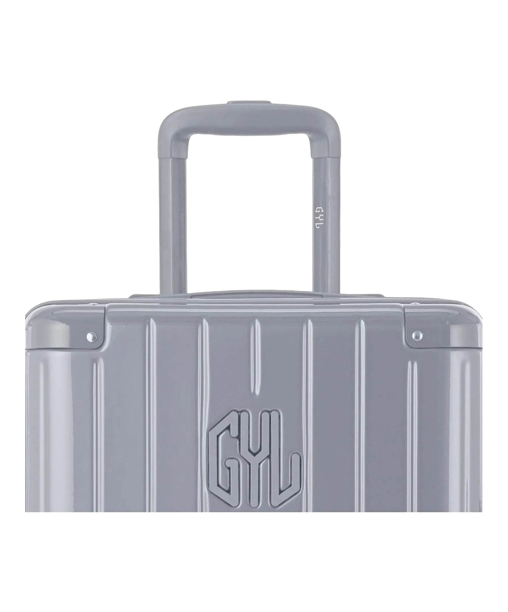 Zoom sur la poignee trolley et le logo GYL de la valise trunk L argent