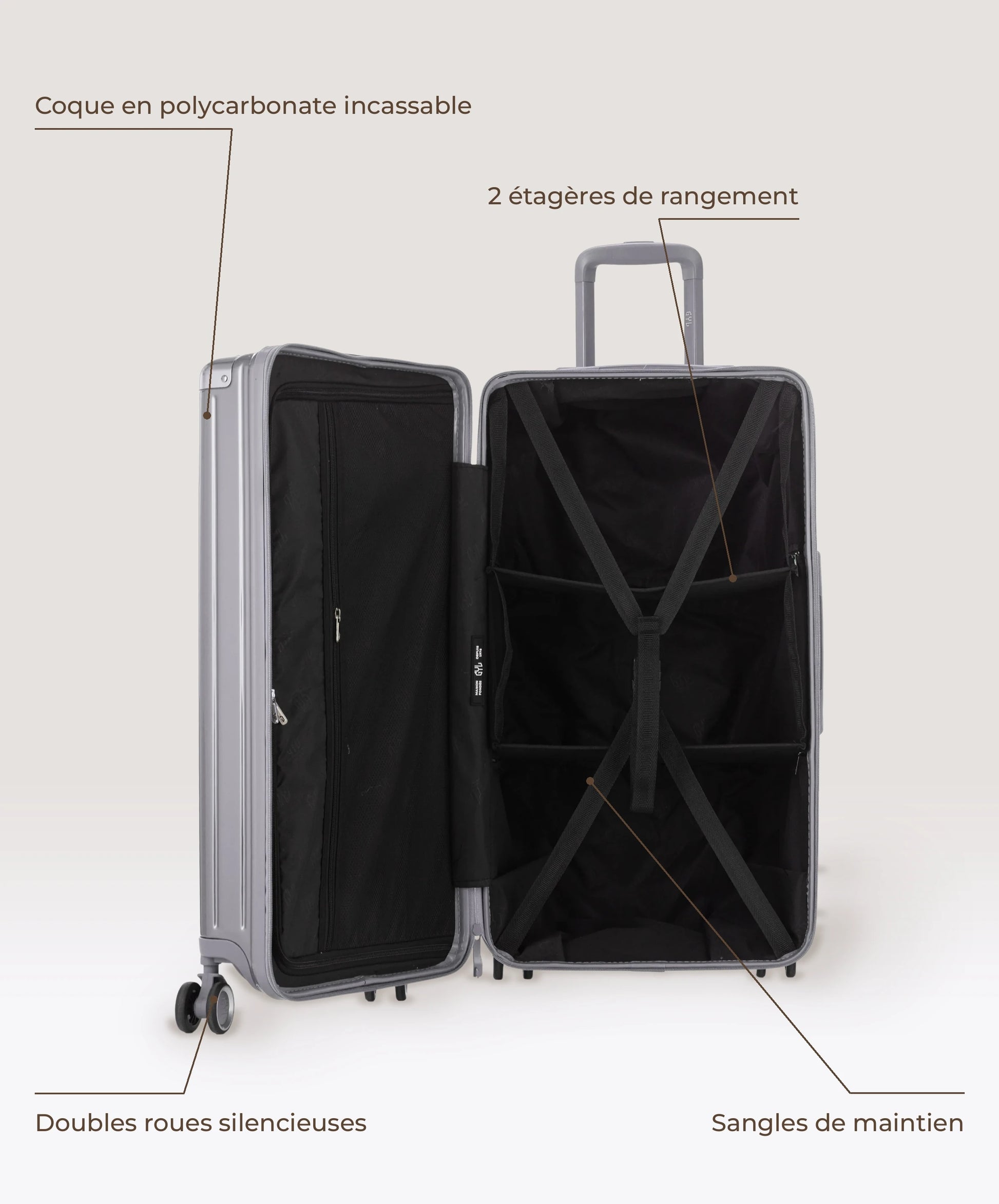 Valise Trunk L Intemporelle GYL en polycarbonate 71 cm coloris argent, interieur ouvert, 2 etageres de rangement, sangles de maintien, coque en polycarbonate et doubles roues