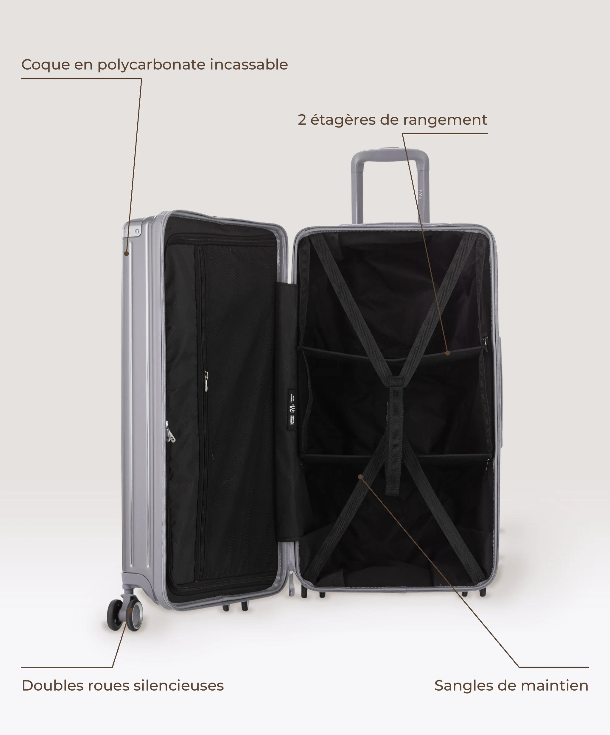 Valise Trunk L Intemporelle GYL en polycarbonate 71 cm coloris argent, interieur ouvert, 2 etageres de rangement, sangles de maintien, coque en polycarbonate et doubles roues