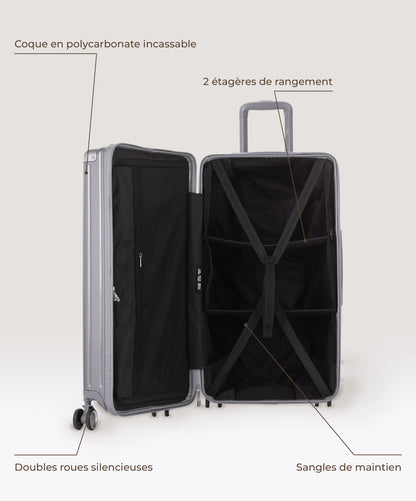 Valise Trunk L Intemporelle GYL en polycarbonate 71 cm coloris argent, interieur ouvert, 2 etageres de rangement, sangles de maintien, coque en polycarbonate et doubles roues