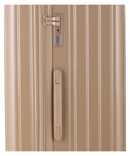 Valise Trunk L Intemporelle GYL en polycarbonate 71 cm coloris champagne gros plan sur la serrure TSA et la fermeture eclair