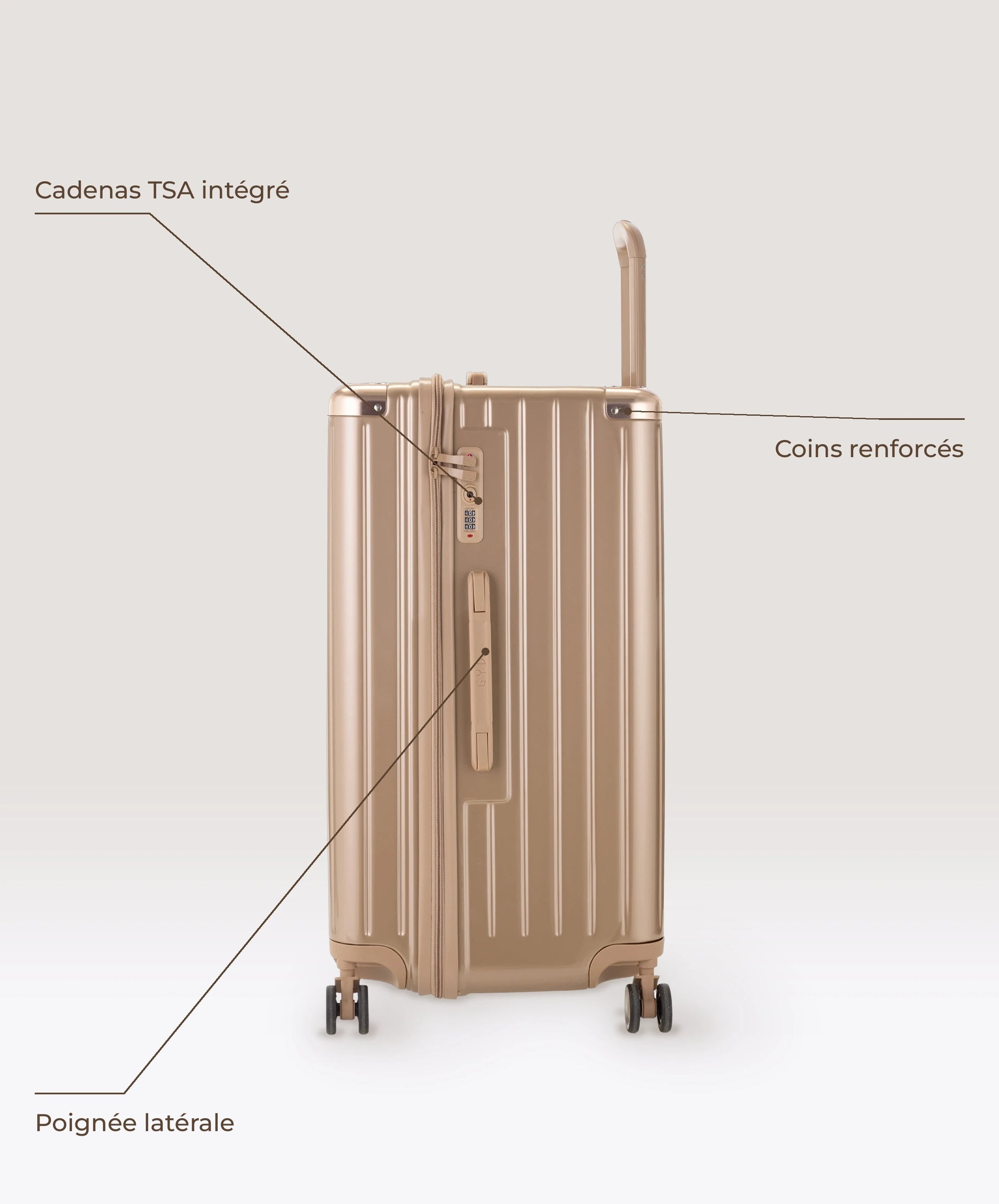 Valise Trunk L Intemporelle GYL en polycarbonate 71 cm coloris champagne, vue de profil, cadenas TSA integre, poignee laterale et coins renforces