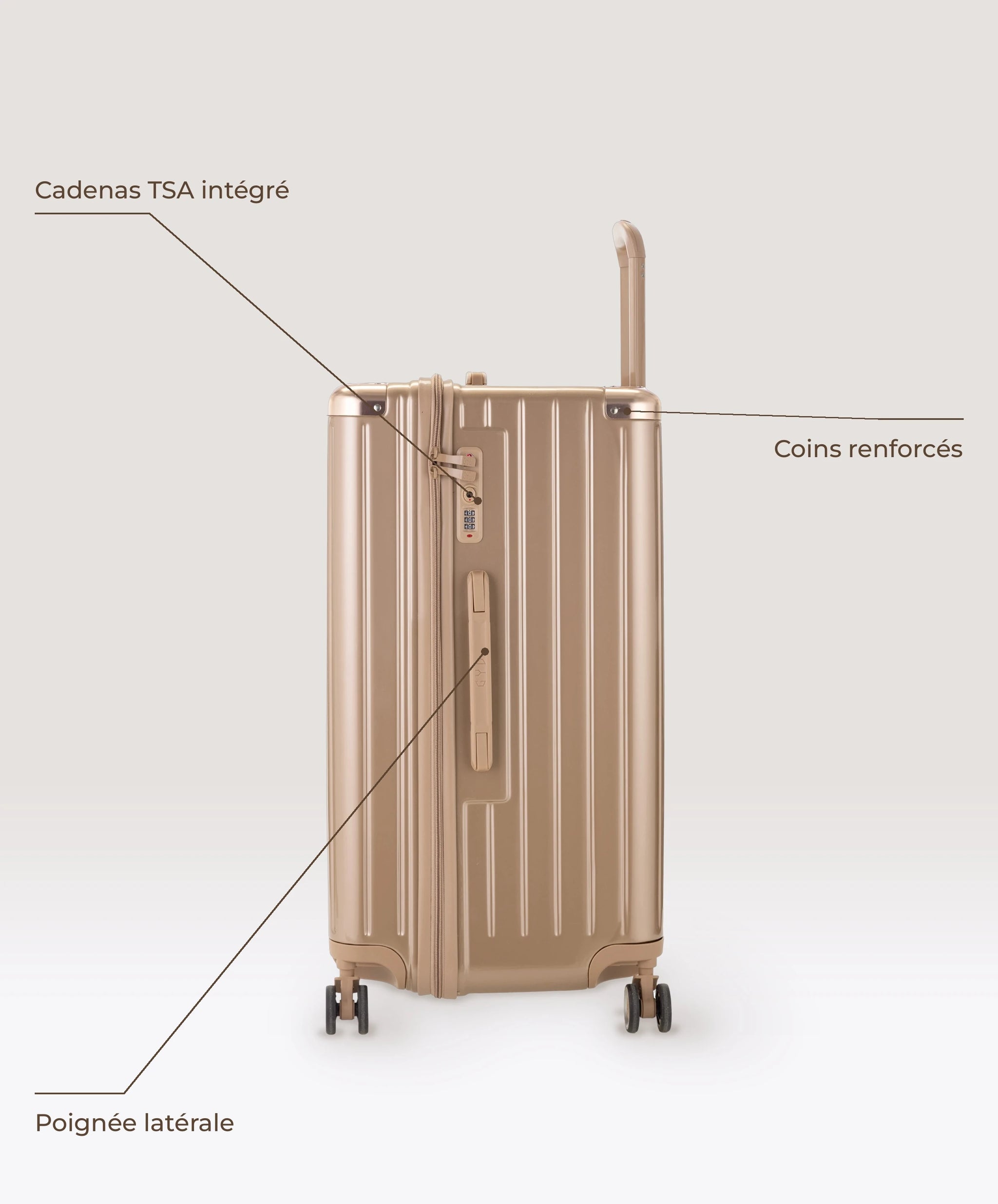Valise Trunk L Intemporelle GYL en polycarbonate 71 cm coloris champagne, vue de profil, cadenas TSA integre, poignee laterale et coins renforces