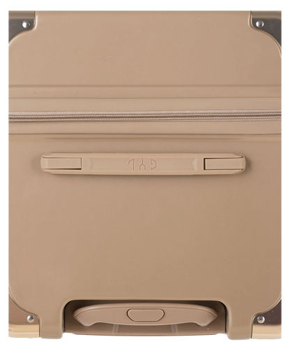 Valise Trunk L Intemporelle GYL en polycarbonate 71 cm coloris champagne vue du dessus avec poignee de portage et coins renforces