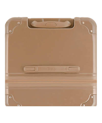 Vue du dessus de la valise trunk GYL L champagne en polycarbonate avec poignee