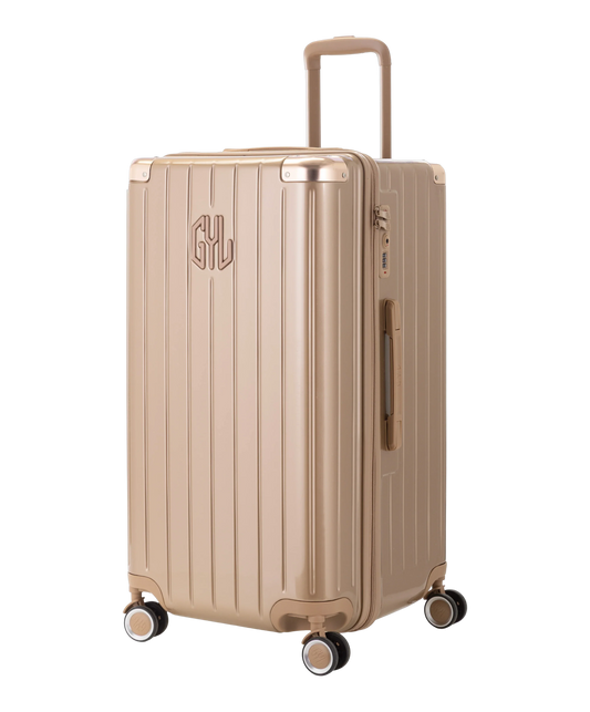 Valise Trunk L Intemporelle GYL en polycarbonate 71 cm coloris champagne vue trois quarts avant