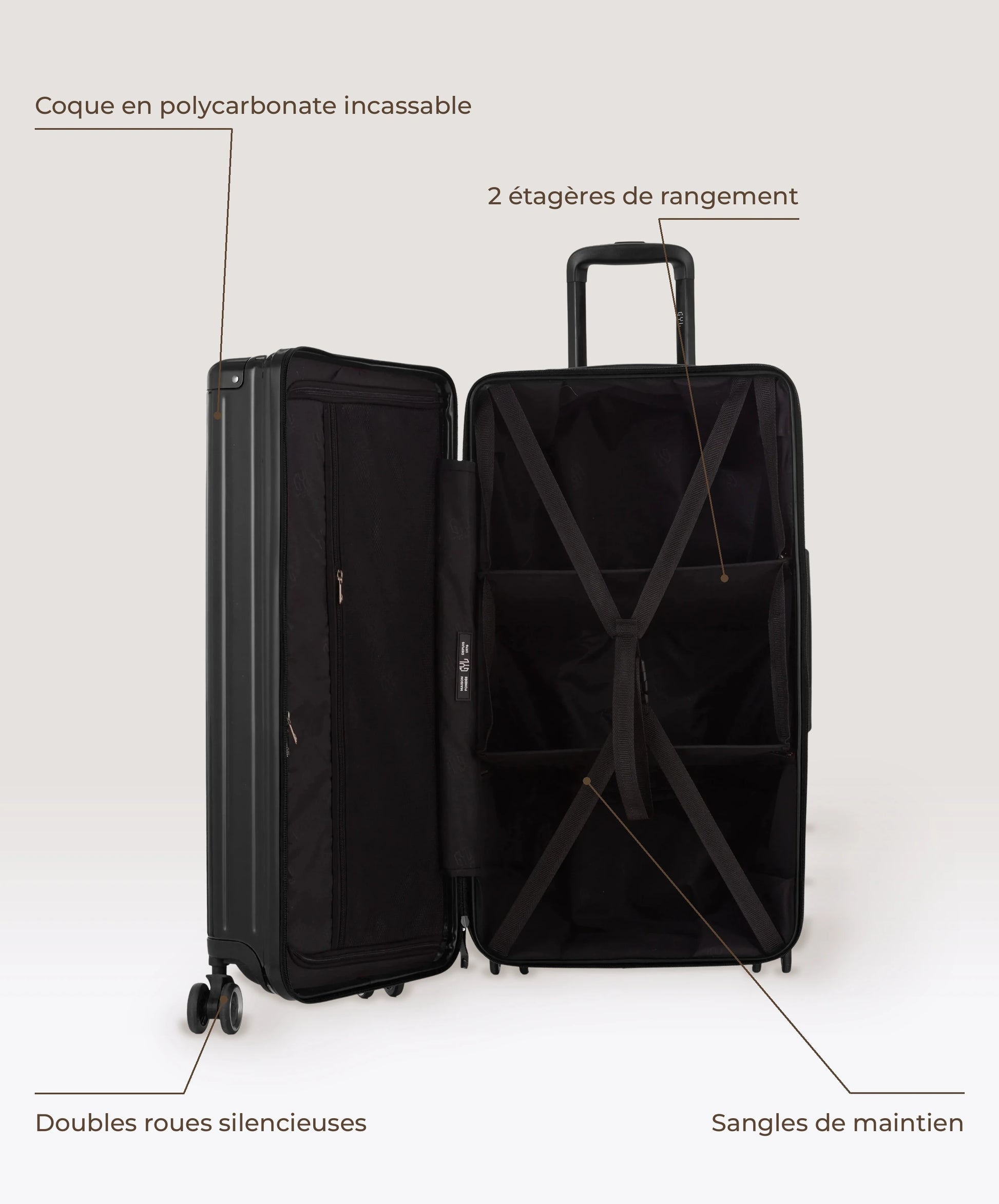 Valise Trunk L Intemporelle GYL en polycarbonate 71 cm coloris noir, interieur ouvert, 2 etageres de rangement, sangles de maintien, coque en polycarbonate et doubles roues