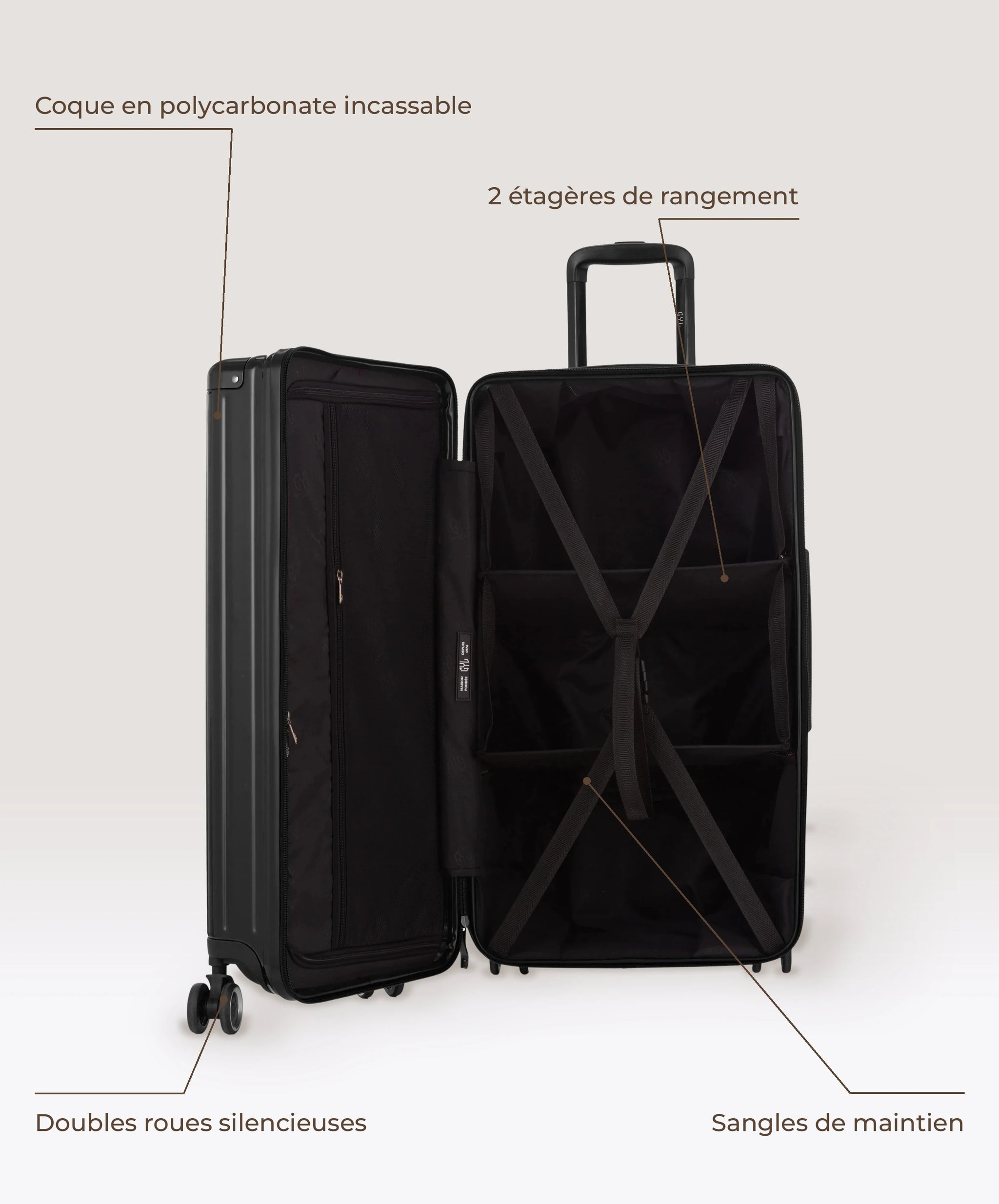 Valise Trunk L Intemporelle GYL en polycarbonate 71 cm coloris noir, interieur ouvert, 2 etageres de rangement, sangles de maintien, coque en polycarbonate et doubles roues