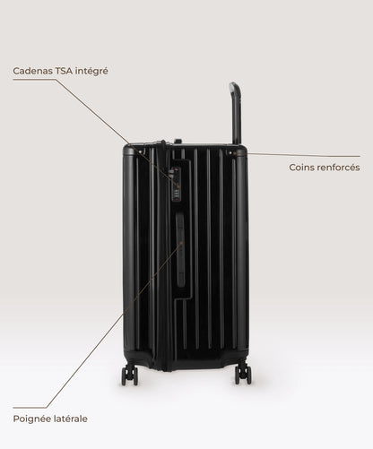 Valise Trunk L Intemporelle GYL en polycarbonate 71 cm coloris noir, vue de profil, cadenas TSA integre, poignee laterale et coins renforces