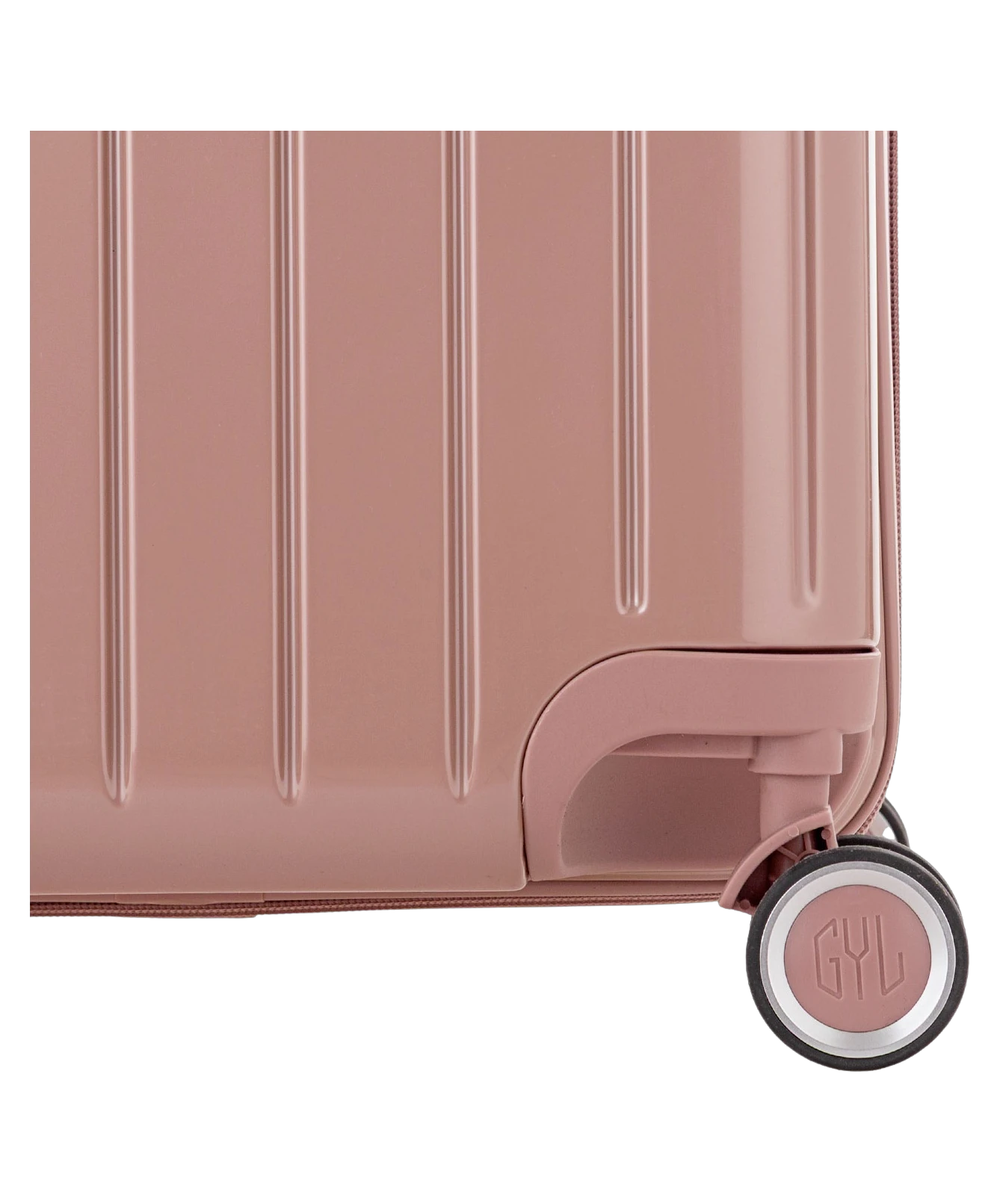 Valise Trunk L Intemporelle GYL en polycarbonate 71 cm coloris rose gold gros plan sur une roulette double 360 degres siglee GYL