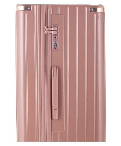 Valise Trunk L Intemporelle GYL en polycarbonate 71 cm coloris rose gold gros plan sur la serrure TSA et la fermeture eclair