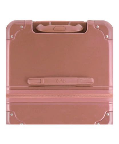 Vue du dessus de la valise trunk GYL L rose gold en polycarbonate avec poignee