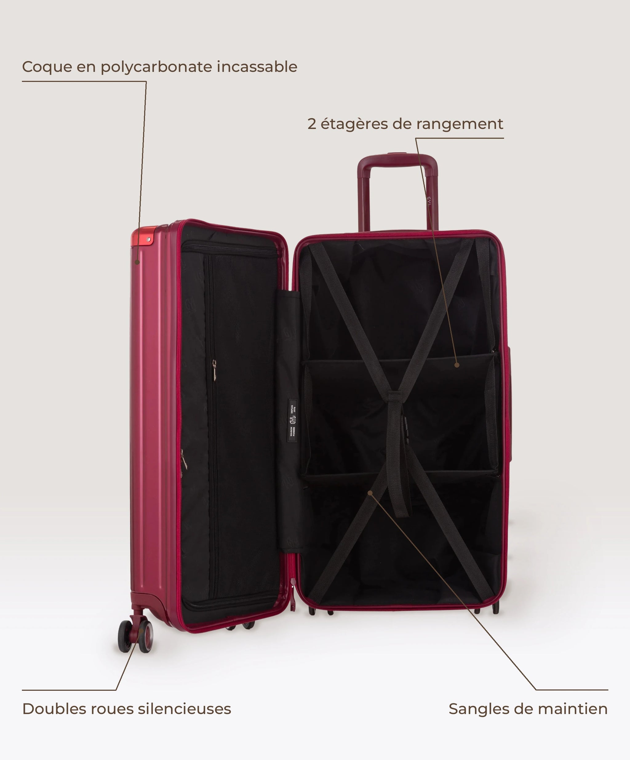 Valise Trunk L Intemporelle GYL en polycarbonate 71 cm coloris rouge fonce, interieur ouvert, 2 etageres de rangement, sangles de maintien, coque en polycarbonate et doubles roues