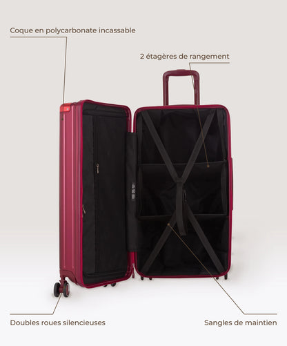 Valise Trunk L Intemporelle GYL en polycarbonate 71 cm coloris rouge fonce, interieur ouvert, 2 etageres de rangement, sangles de maintien, coque en polycarbonate et doubles roues