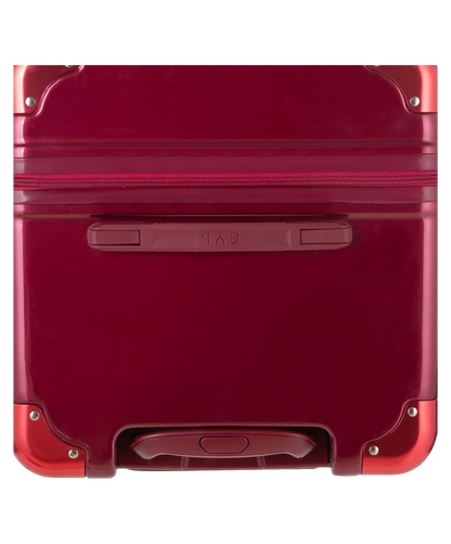Valise Trunk L Intemporelle GYL en polycarbonate 71 cm coloris rouge fonce vue du dessus avec poignee de portage et coins renforces
