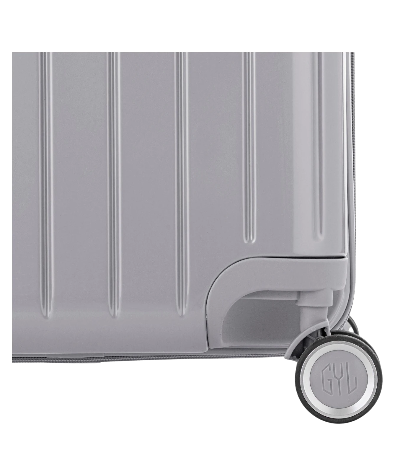 Valise Trunk XL Intemporelle GYL en polycarbonate 78 cm coloris argent gros plan sur une roulette double 360 degres siglee GYL