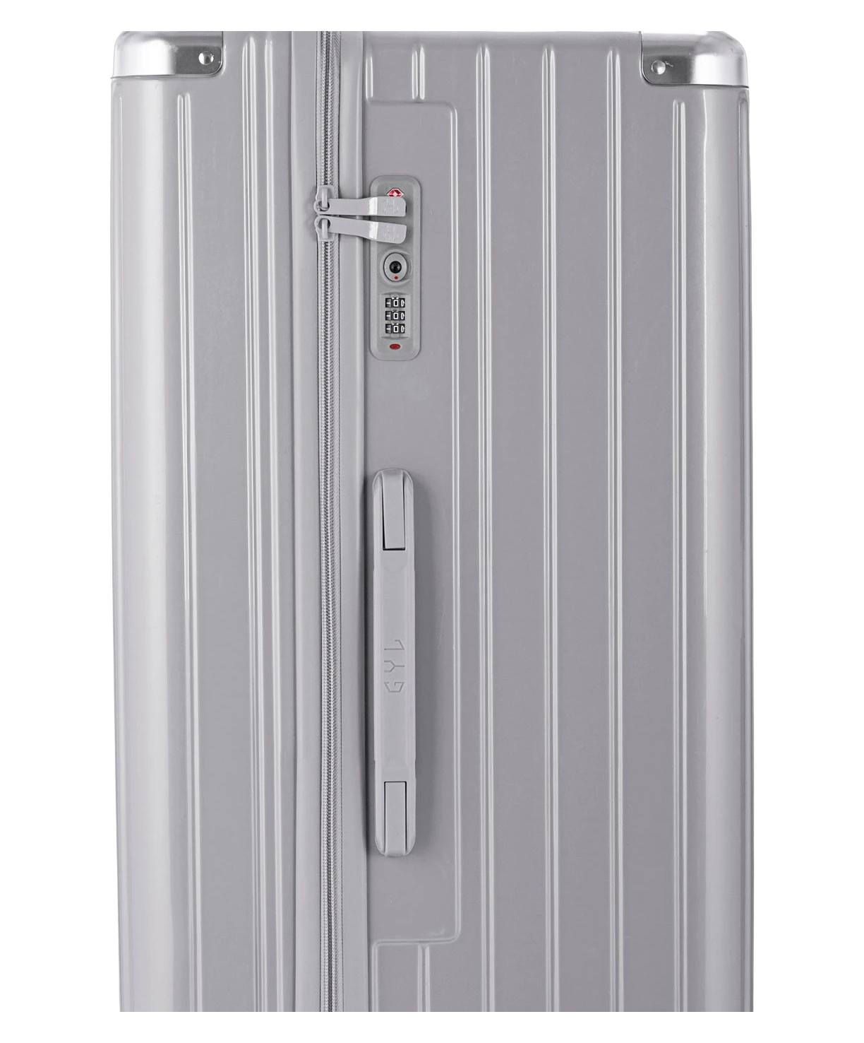 Valise Trunk XL Intemporelle GYL en polycarbonate 78 cm coloris argent gros plan sur la serrure TSA et la fermeture eclair